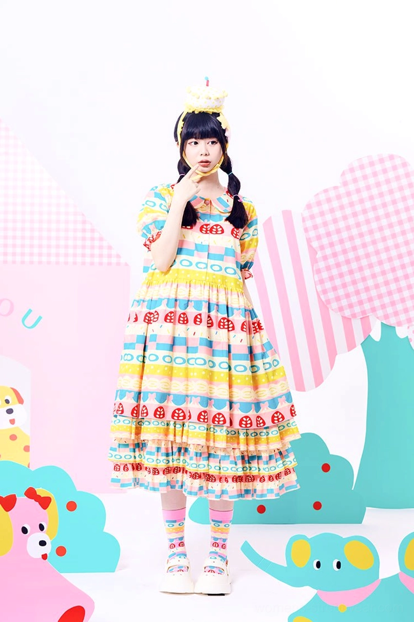 Colorful pastel Peter Pan collar dollcore midi dress with short ruffle sleeves and ladybug print front full body view