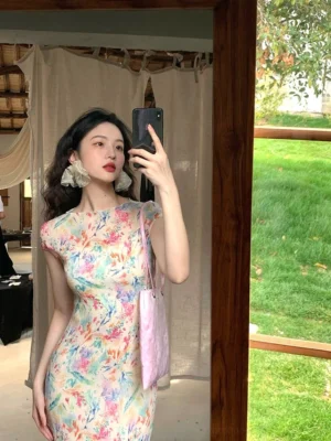 Pastel watercolor floral cheongsam-inspired maxi dress front view with high neckline and slim fitted silhouette