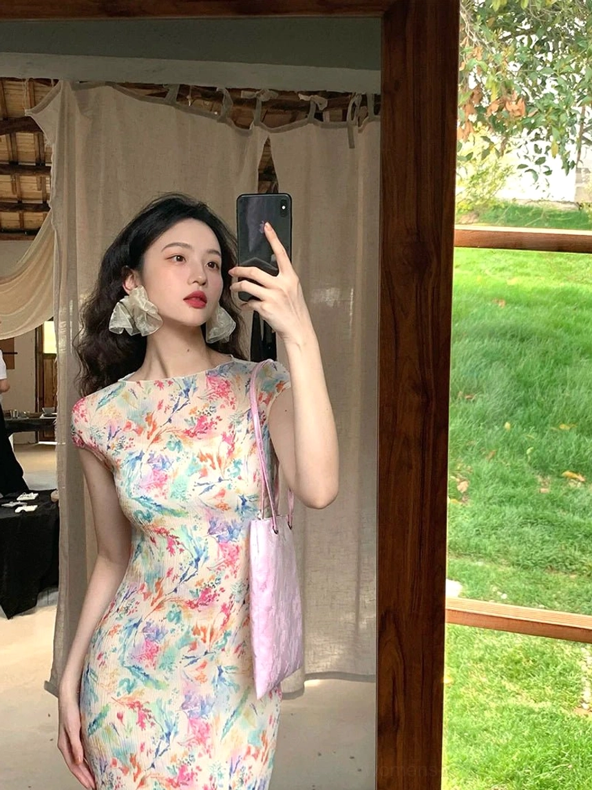 Pastel watercolor floral cheongsam-inspired maxi dress front view with high neckline and slim fitted silhouette