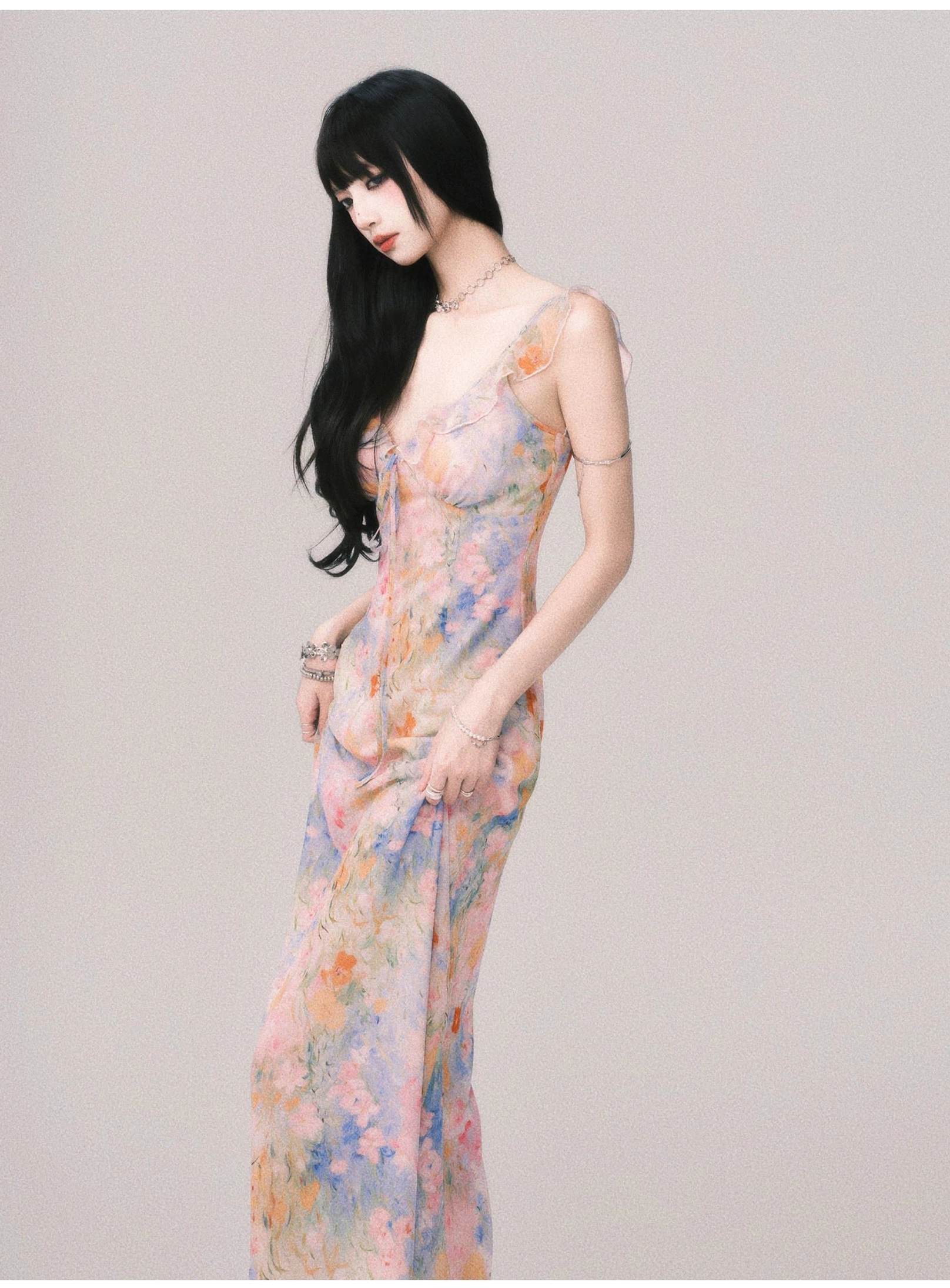 Pastel watercolor floral ruffle maxi dress for women with deep V-neck and delicate spaghetti straps
