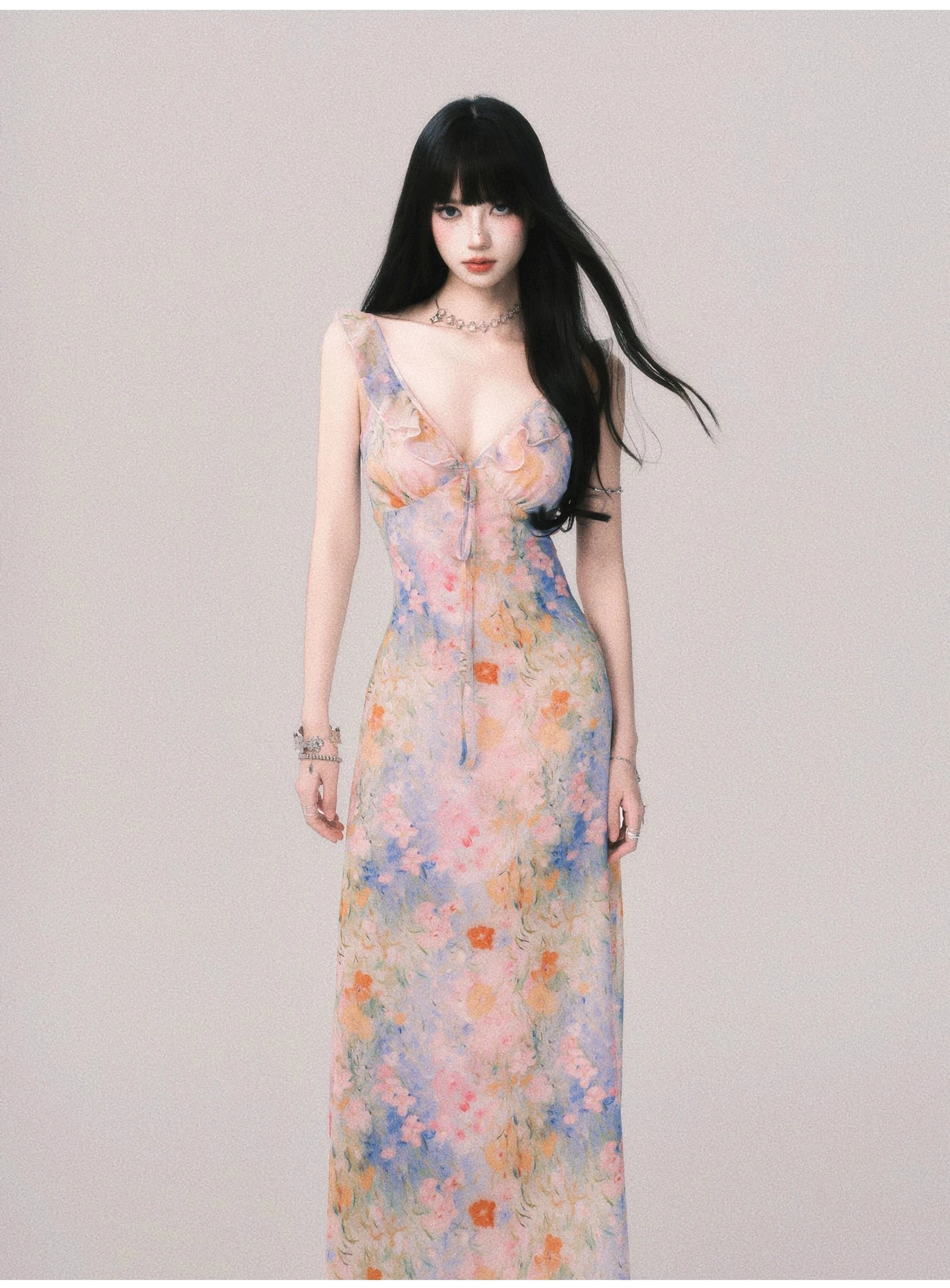 Romantic pastel floral ruffle maxi slip dress featuring a deep V neck and lightweight sheer overlay