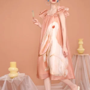 Peach pink enchanted forest rabbit print midi dress with ruffled flutter sleeves and dreamy sheer organza fabric