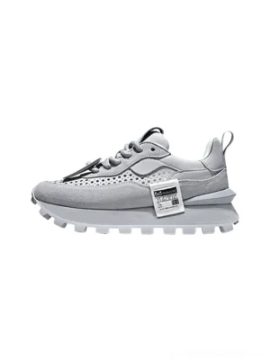 Light gray perforated leather platform casual shoes shown from the front three-quarter angle with breathable upper and rugged layered outsole