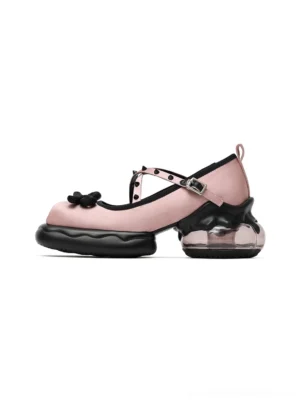 Pink bow strap platform Mary Jane shoes with oversized toe bow, adjustable buckle strap, chunky clear platform heel, and Y2K streetwear styling