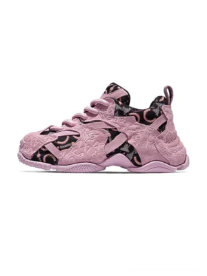 Pink embroidered chunky dad sneakers in a left front side view with suede-textured upper, tonal monogram detailing, lace-up closure and thick layered platform sole