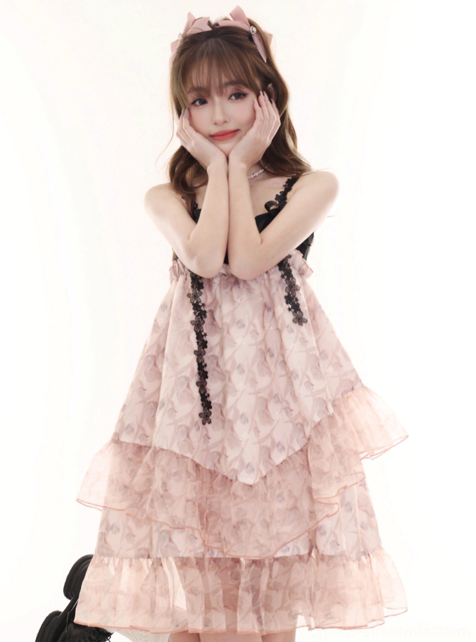 Pink floral slip dress with bare shoulders bow details and romantic ruffled tulle layers