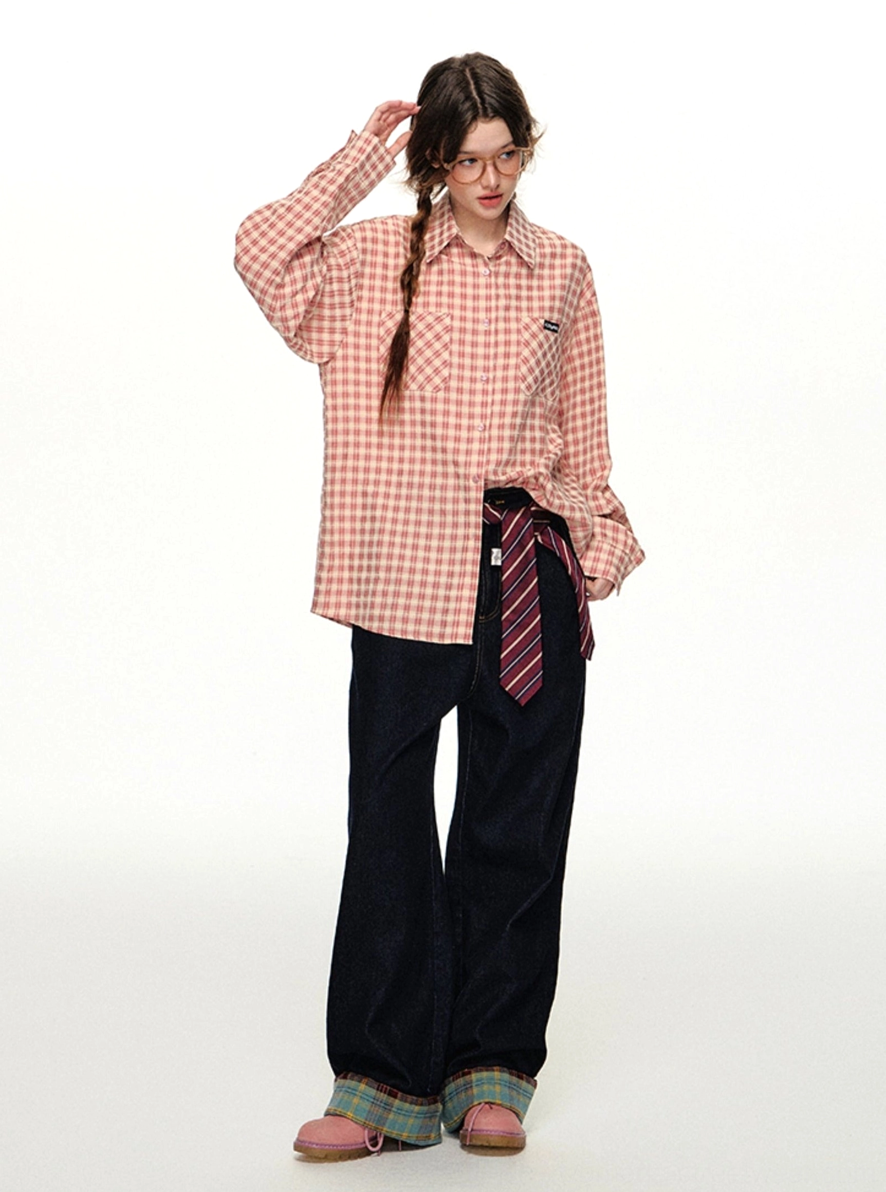 Pink gingham casual shirt product view highlighting the button front, long sleeves, chest patch pocket, and loose streetwear fit