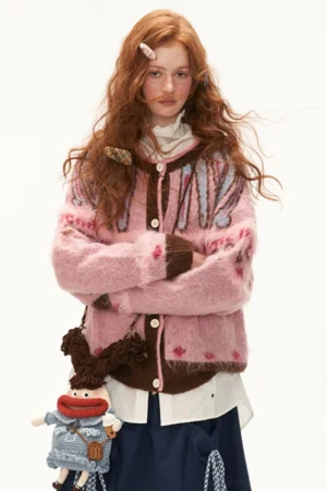 Pink mohair Fair Isle heart knit cardigan front view with brown contrast trim and button closure