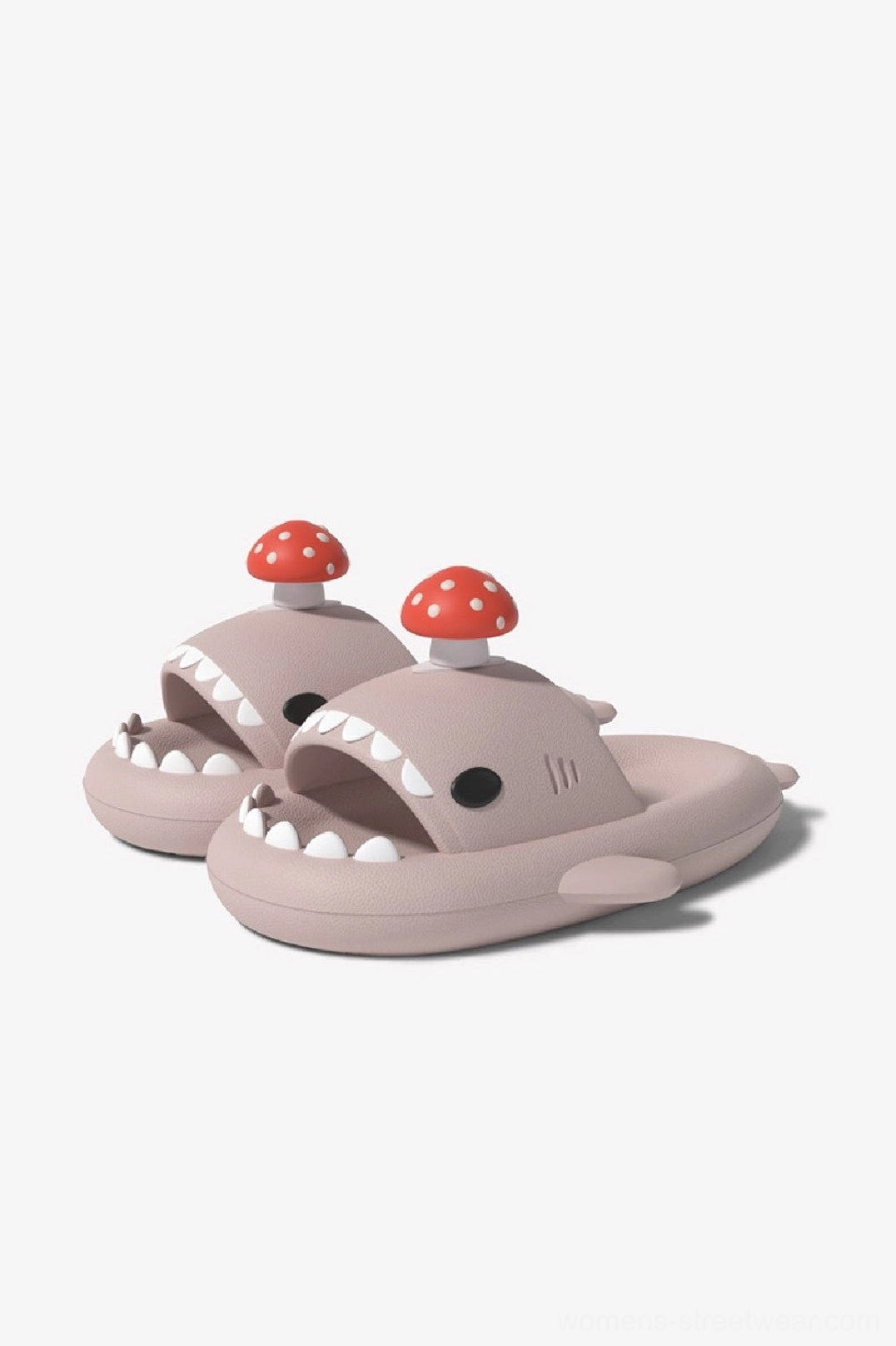 Pink monster shark slide slippers with cute oversized character shape for relaxed homewear