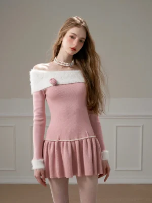Pink off-shoulder knit skater mini dress with white fuzzy collar and cuffs, 3D rose detail, pearl waist trim, and ruffle hem front view