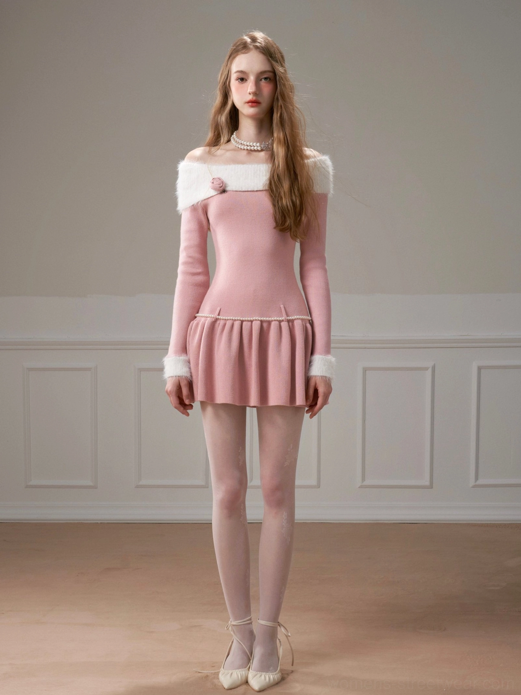 Pink off-shoulder rib knit skater mini dress styled with sheer tights and pink ballet heels, featuring pearl waist trim and ruffle hem