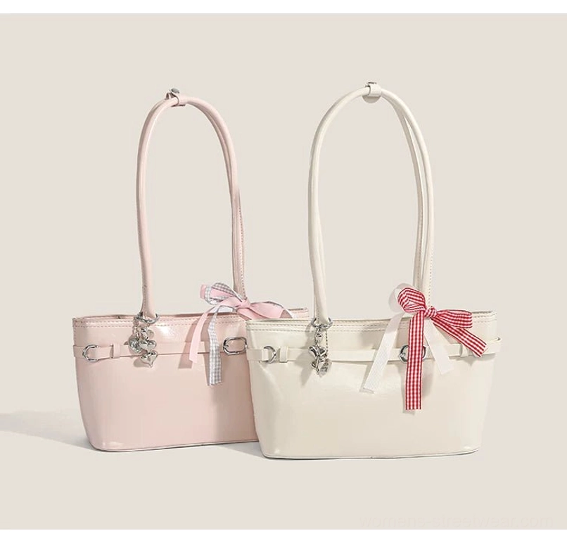 Pink and off-white cherry picnic underarm baguette bags displayed together with gingham ribbon accents and silver-tone hardware