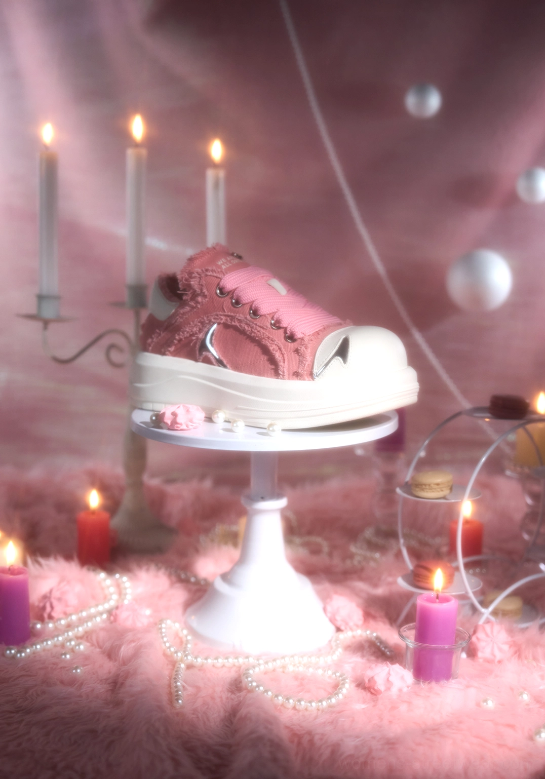 Side profile of pink platform skate sneaker with wide flat laces, white rubber toe cap, frayed canvas upper, and thick white platform sole