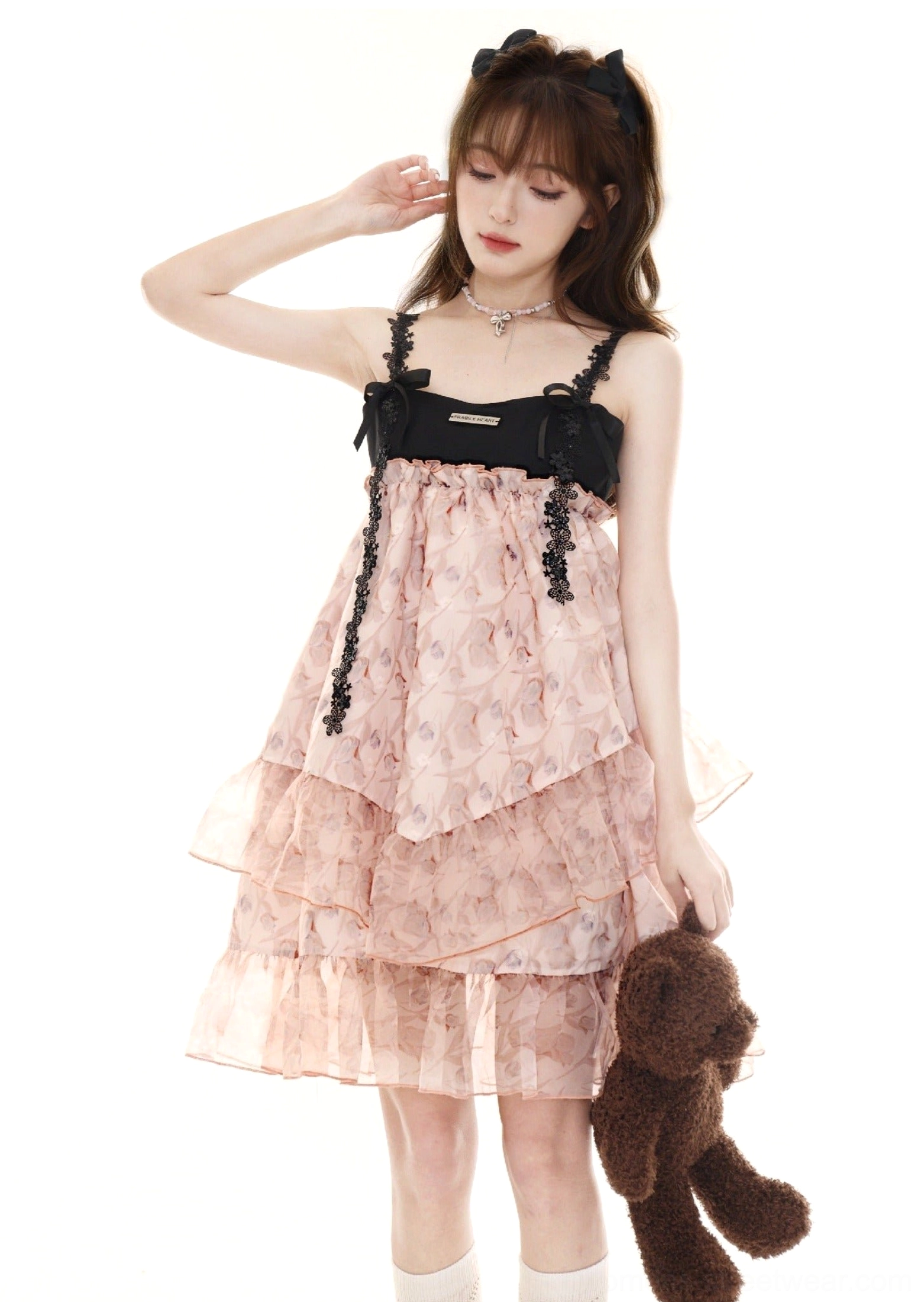 Pink printed floral tulle slip dress with spaghetti straps layered skirt and white crew socks