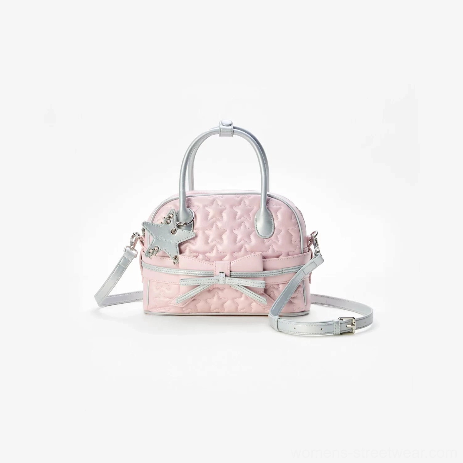 Pink quilted bow mini bowling handbag studio view with star-textured stitching silver bow hardware and shoulder strap