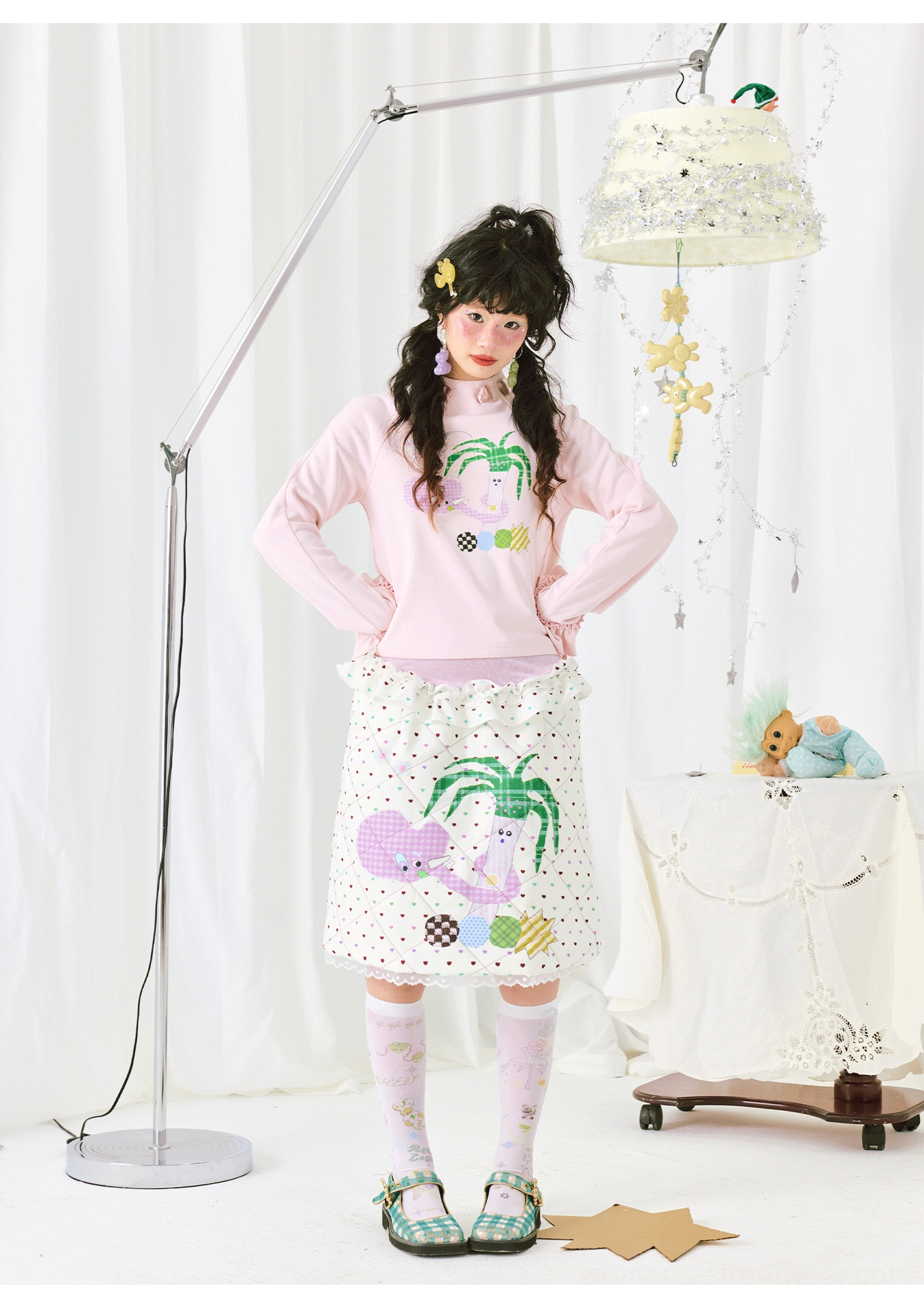 Full front outfit styling featuring a pink ruffle sleeve top with palm tree print and coordinated playful Korean fashion accessories