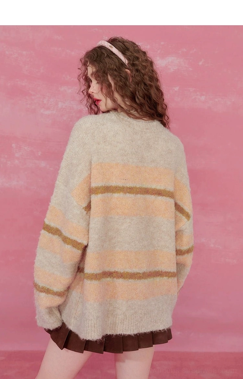 Pink striped fuzzy knit sweater in soft brushed knit fabric with pastel horizontal stripe pattern