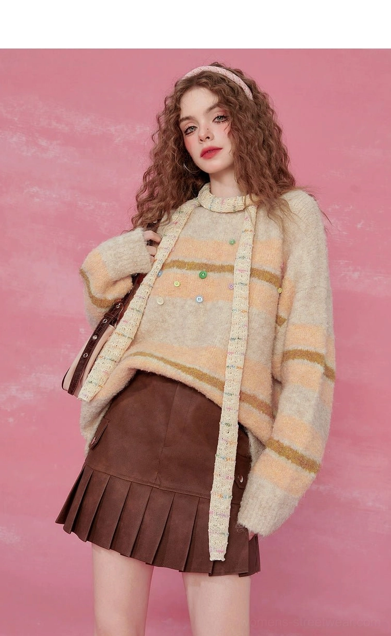 Pink striped fuzzy knit sweater with playful color-block stripes and ribbed trim detail