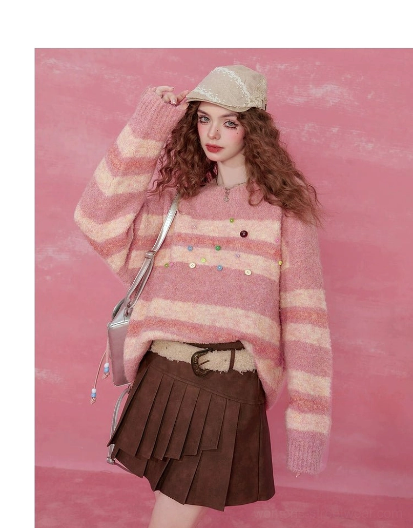 Pink striped fuzzy knit sweater upper body view with playful colorful button embellishments