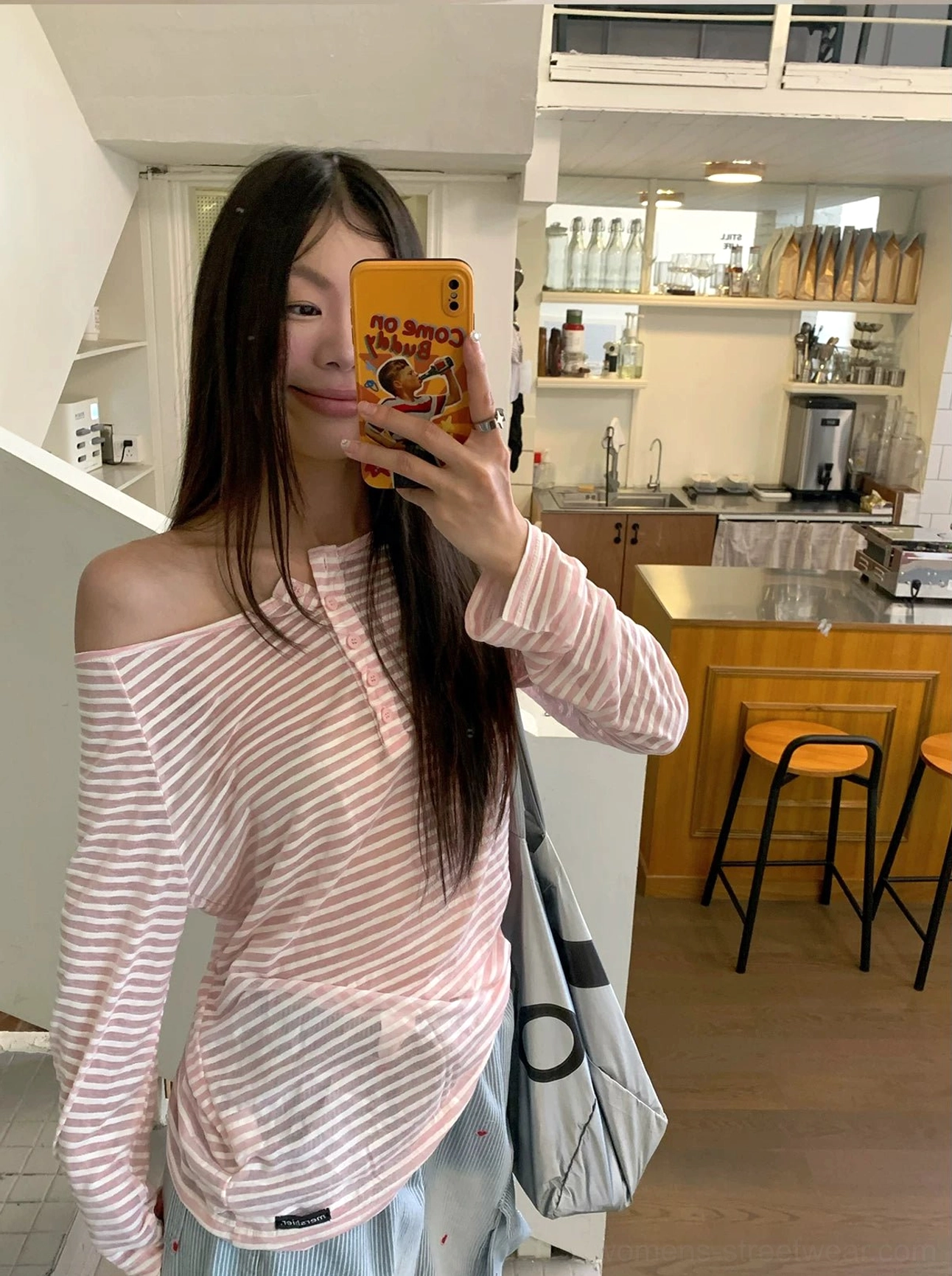 Pink white striped off-shoulder henley long sleeve tee showing lightweight semi-sheer knit texture