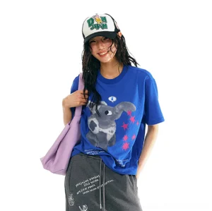 Royal blue pixel elephant graphic oversized streetwear tee with grey elephant print and pink star sprites front view