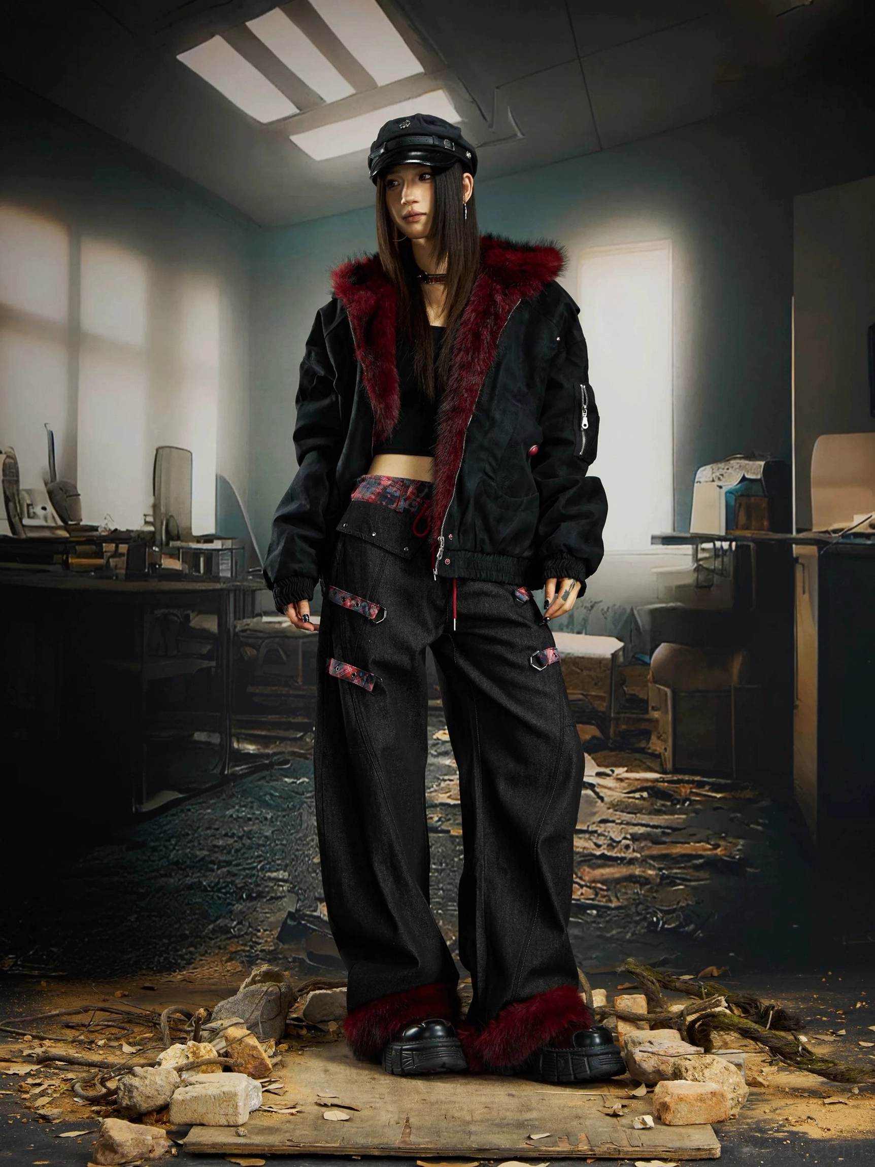 Female model wearing plaid fur-hem streetwear cargo pants with red tartan waistband leg straps and punk bomber jacket
