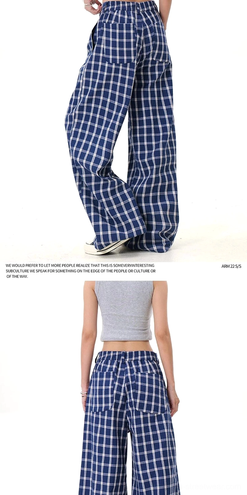 Additional detail view of plaid wide-leg streetwear trousers with relaxed drape and vintage check pattern