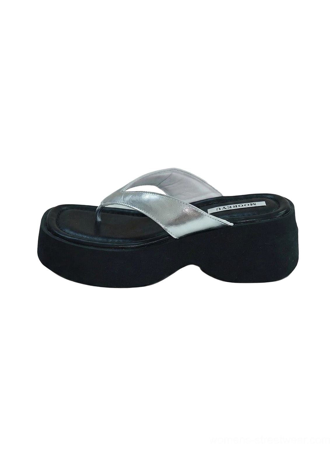 Platform flip-flops with thick black wedge sole and expressive suede toe strap