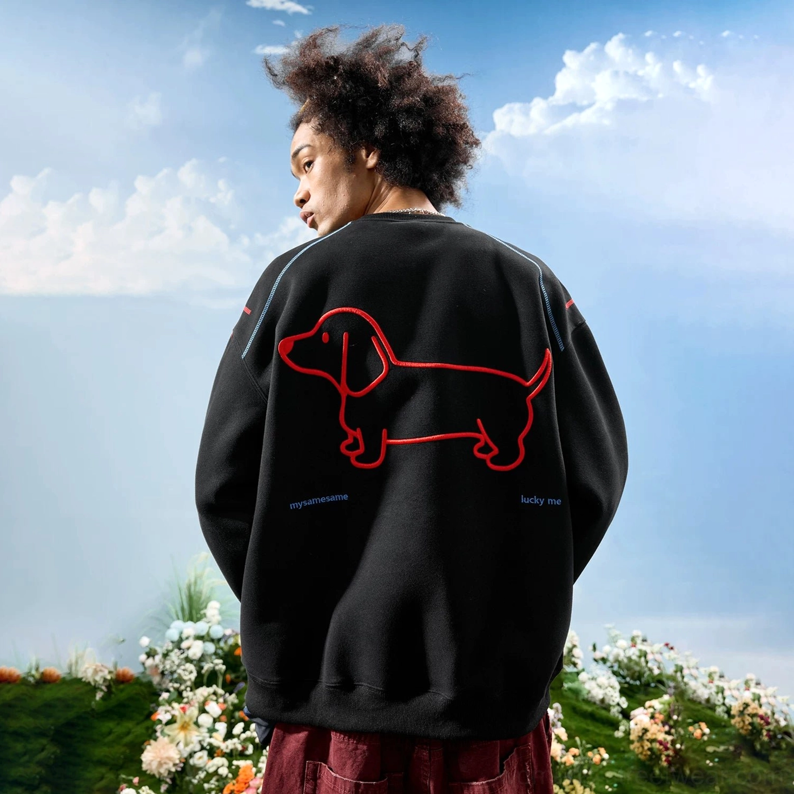 Playful dachshund embroidered sweatshirt with relaxed dropped-shoulder fit for contemporary Seoul-inspired streetwear styling