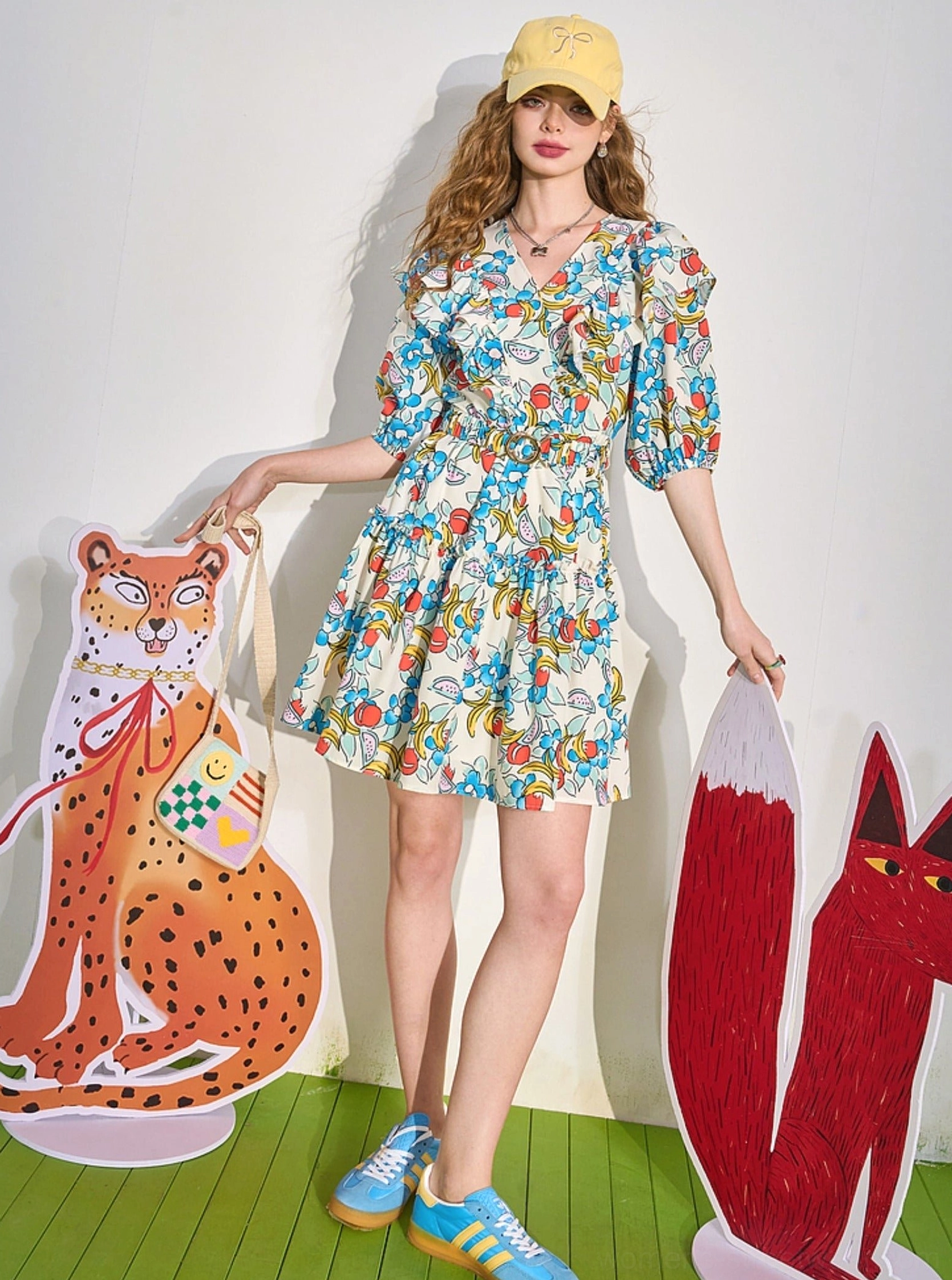 Playful fruit print V-neck mini dress for women styled as colorful Korean-inspired summer fashion