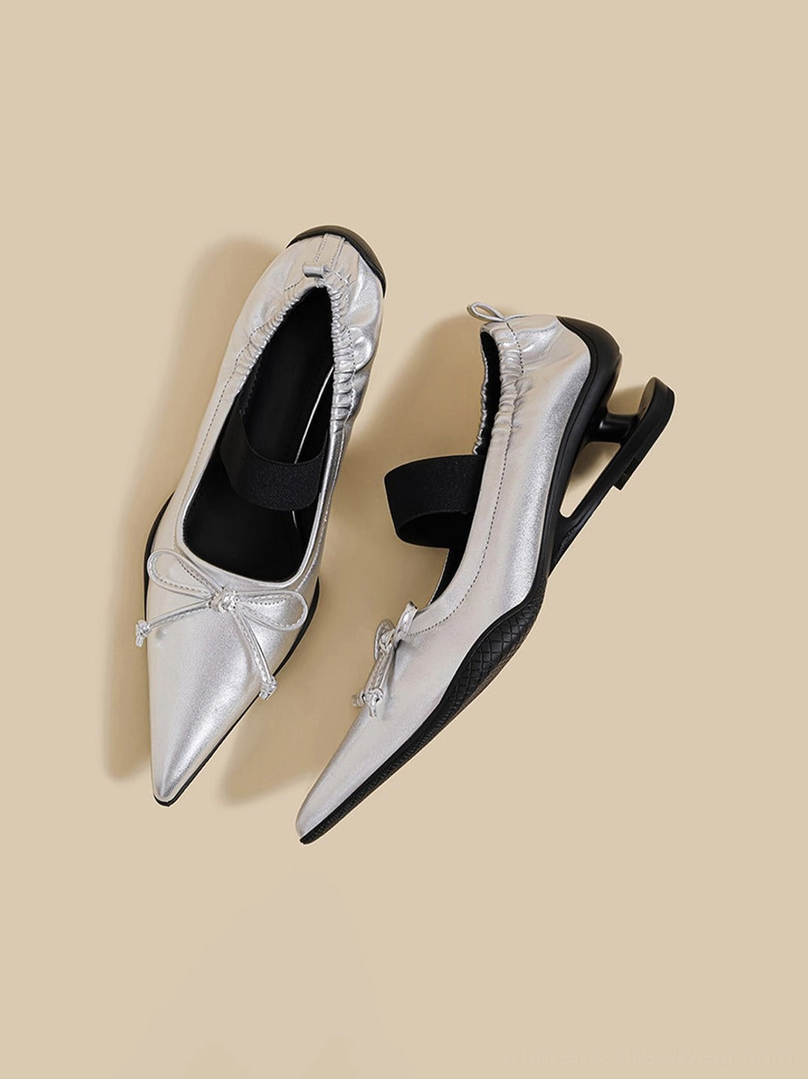 Pointed-toe bow Mary Jane mule heels with elastic straps and architectural curved heel detail