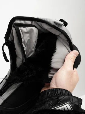 Top view of Polar Flux black and gray winter snow boot with plush faux fur lining, padded interior, and front zipper pull