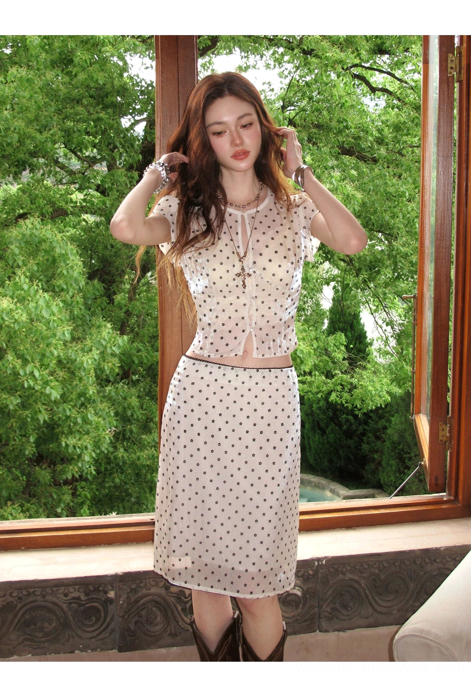 Front view of beige sheer polka dot mesh crop top and high waisted midi skirt streetwear set with black dots