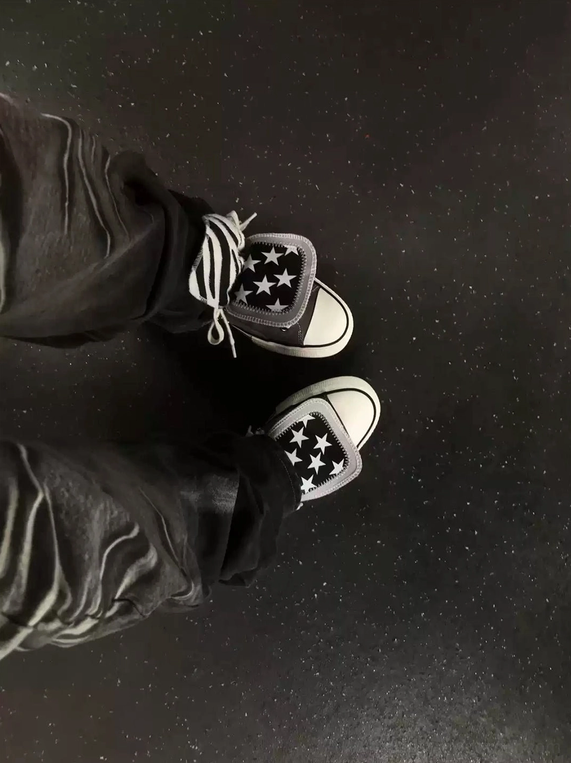 Punk streetwear outfit wearing star collar rivet high-top canvas sneakers viewed from above