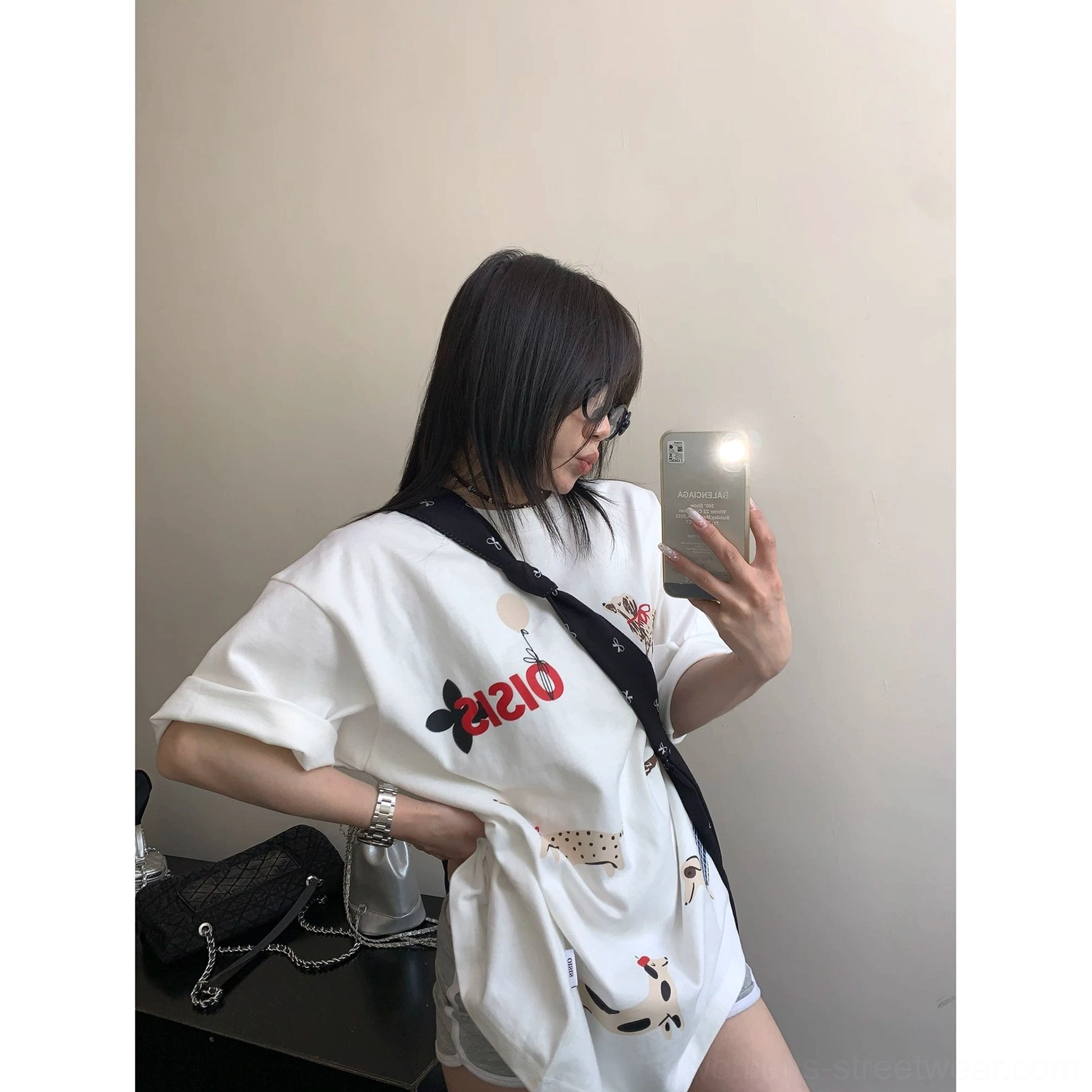 White Puppy Parade oversized dachshund graphic T-shirt side mirror view with rolled sleeve cuffs