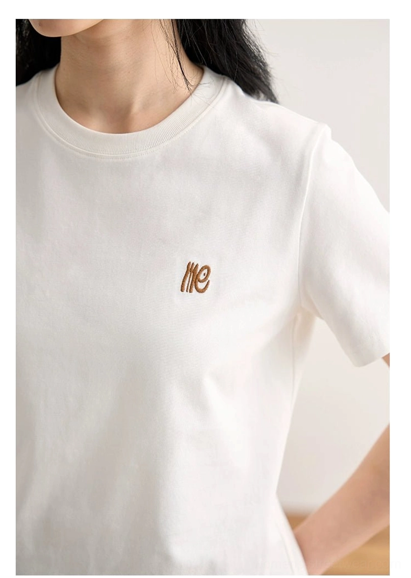 Pure black minimalist embroidered logo crew neck t-shirt gorpcore styling cargo pants sneakers