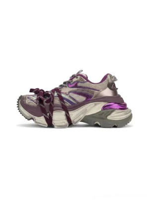 Purple and taupe chunky platform sneakers in side profile with double purple laces, metallic heel trim, textured mixed-material upper, and rugged streetwear outsole