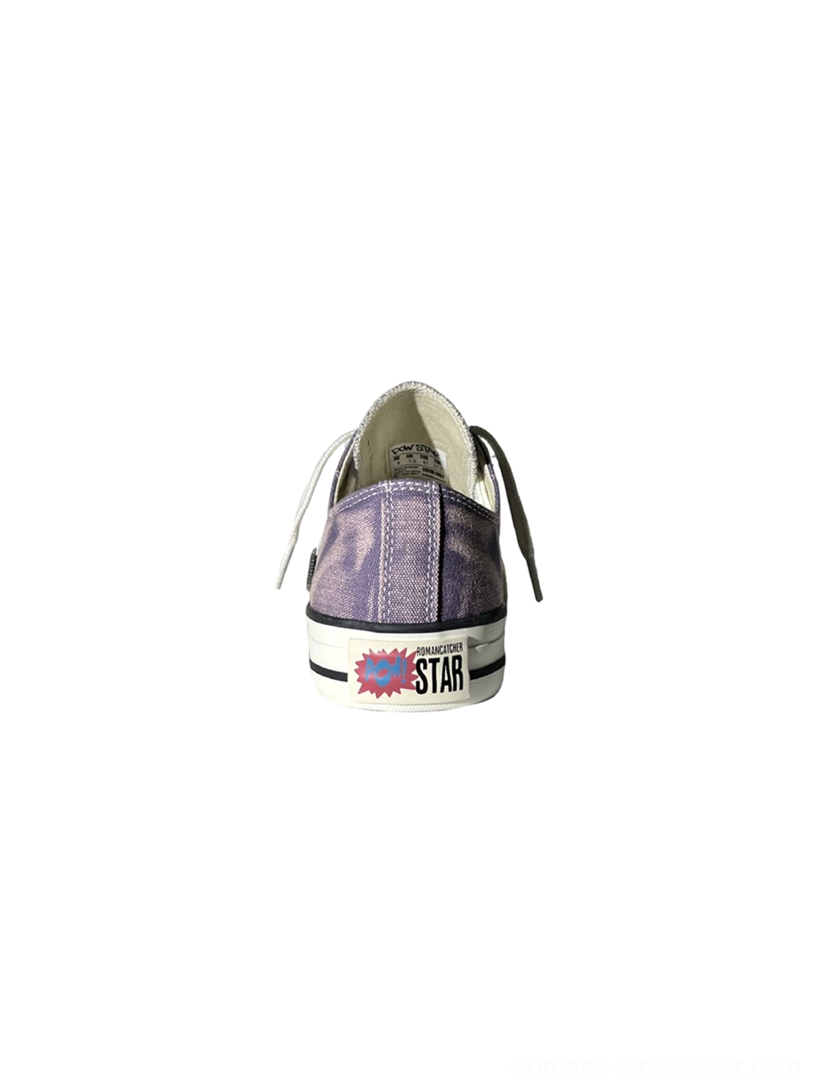 Rear heel view of purple distressed low-top skate sneakers with colorful graphic heel tab white rubber sole and interior label detail