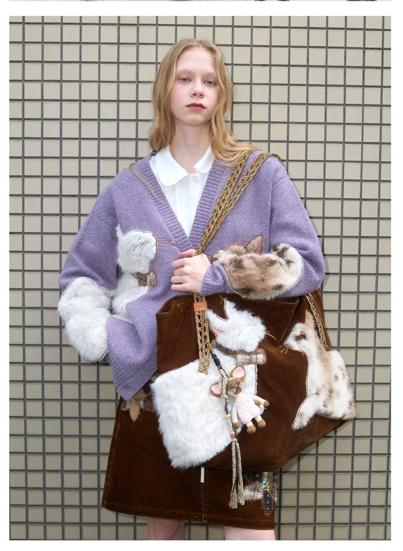 Purple fuzzy cat cardigan styled with a matching furry cat tote bag, white shirt, brown corduroy skirt, and cute Seoul-inspired streetwear details