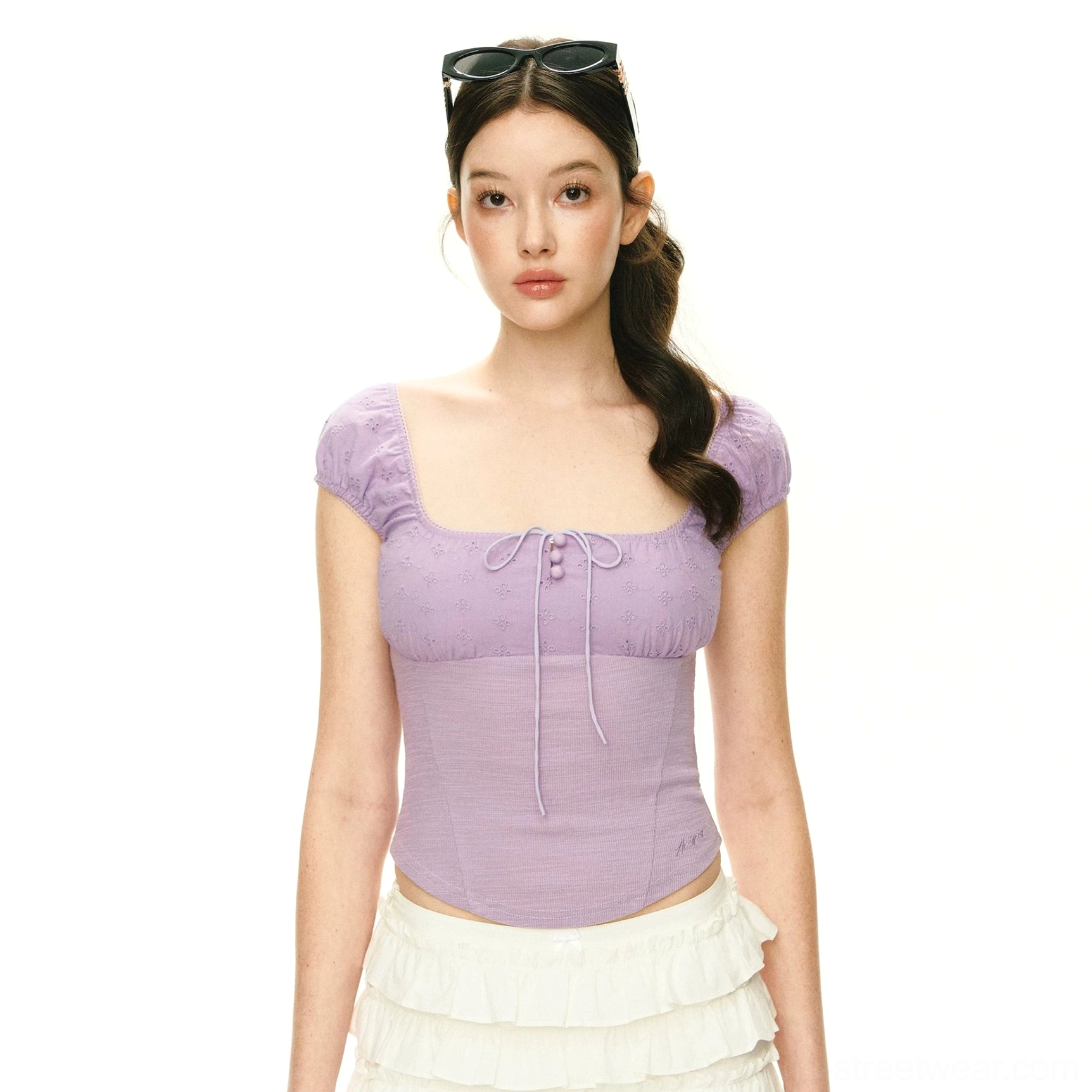 Purple square neck puff sleeve corset-inspired crop top with fitted cropped waist and front tie detail