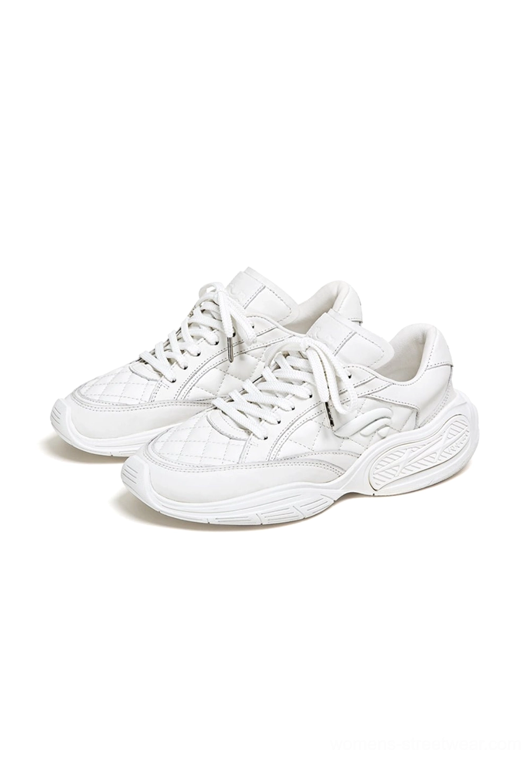 Quilted black and white sport sneakers available in multiple sizes for contemporary women's streetwear