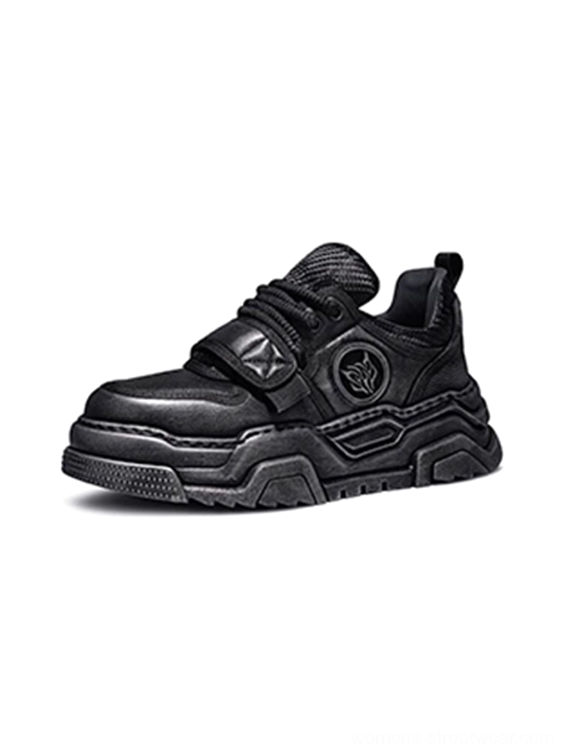 Black chunky leather trail runner sneaker with secure vamp strap and rugged ripple traction outsole
