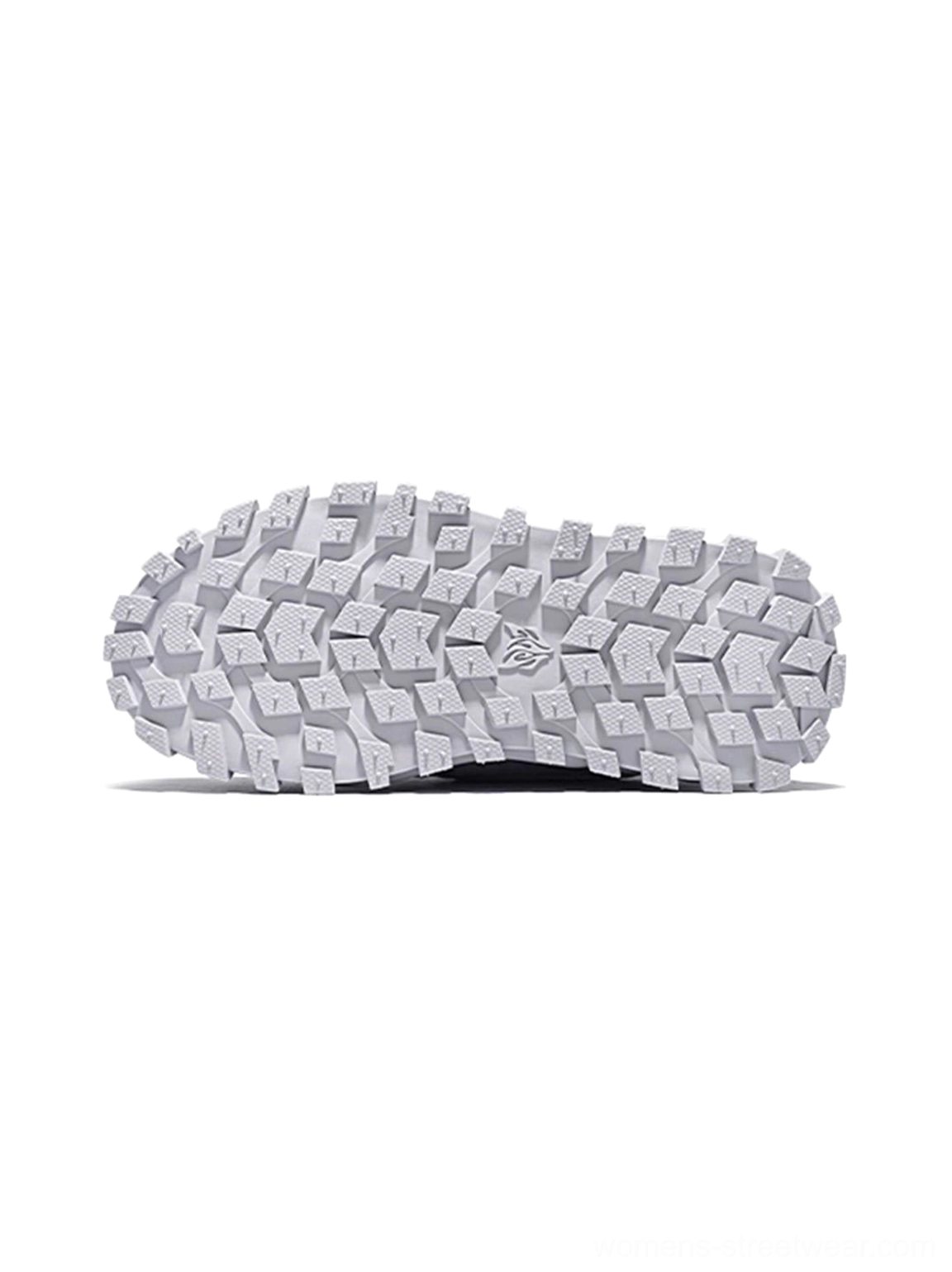 Deep tread EVA rubber outsole detail of quilted leather ripple sole trail runner sneakers