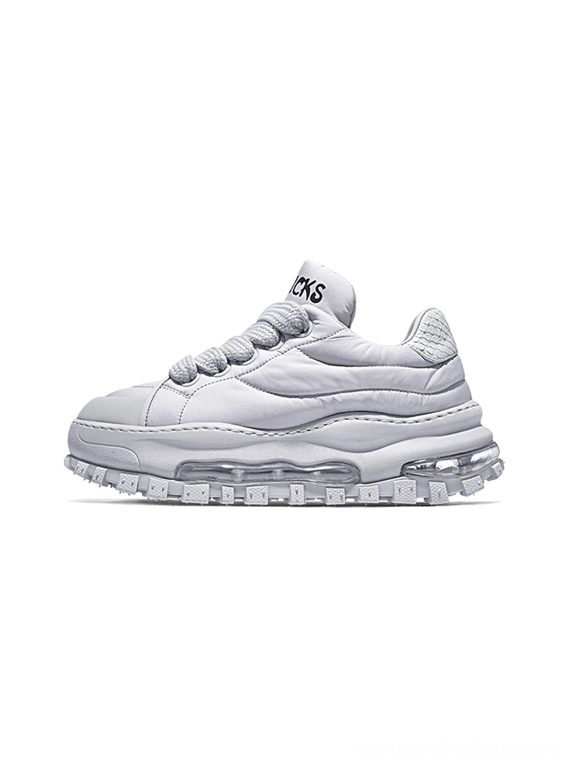 White quilted leather ripple sole trail runner sneaker shown in left side studio product view