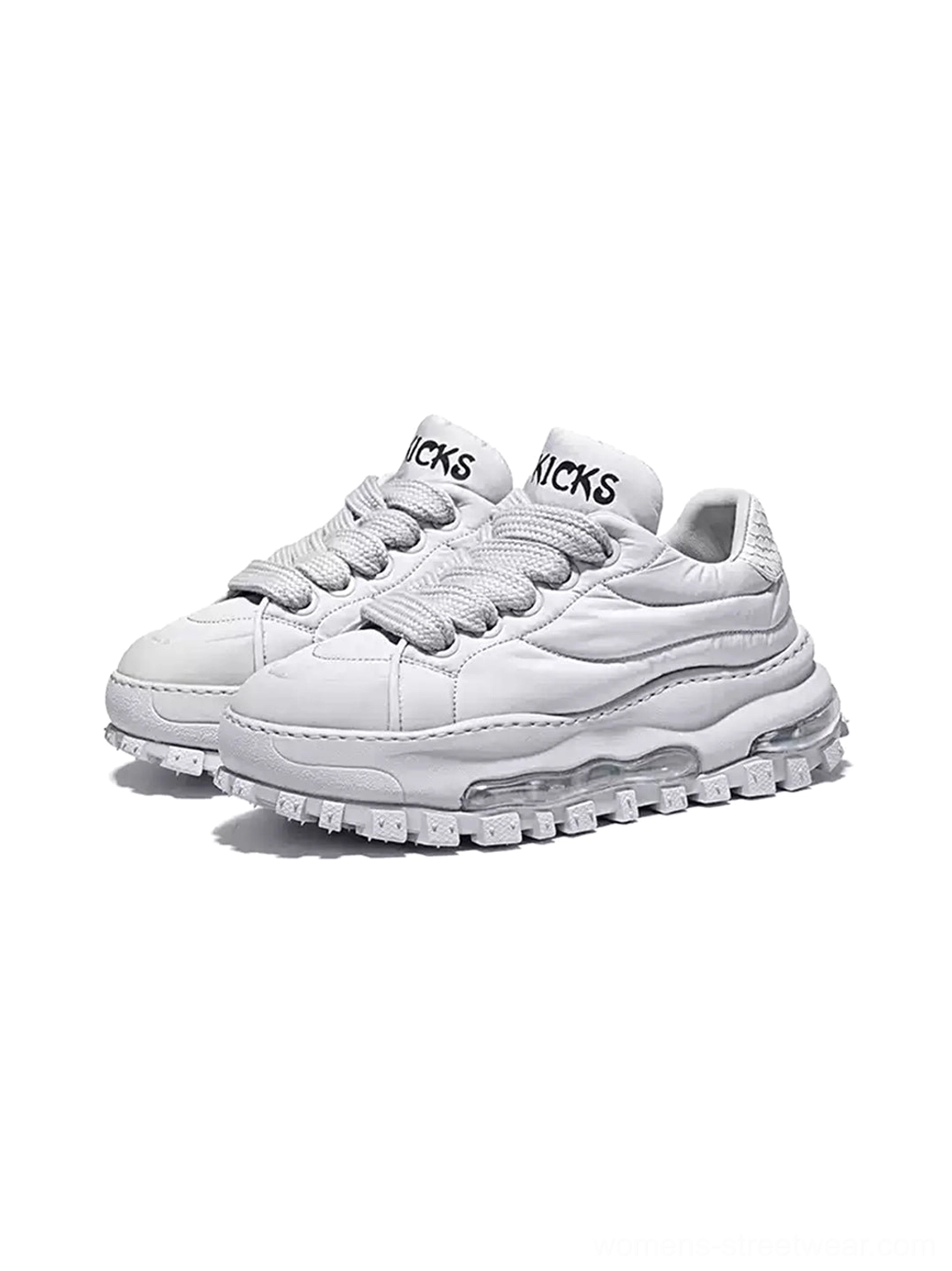 Pair of white quilted leather ripple sole trail runner sneakers displayed side by side in studio