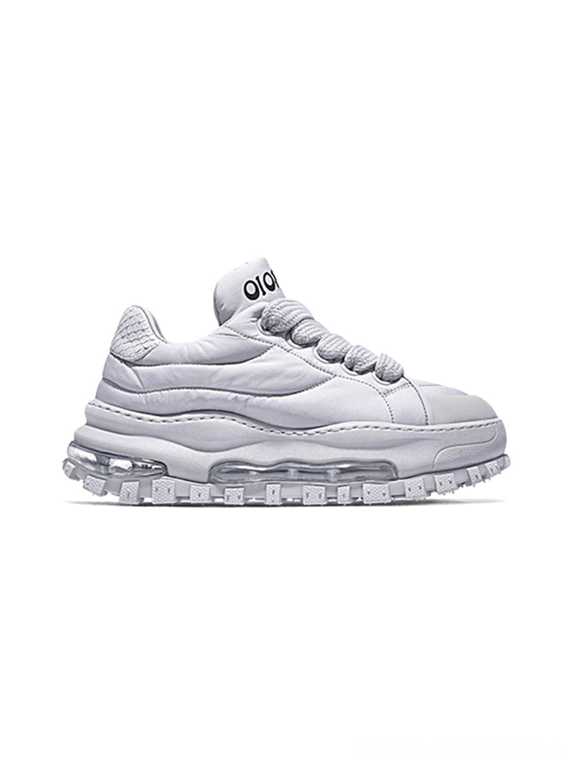 White quilted leather trail runner sneaker with padded upper and chunky ripple sole in right side view
