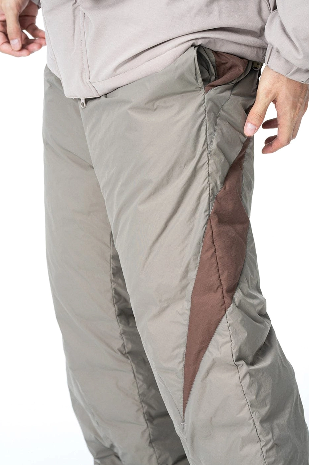 Quilted wide-leg padded track pants with splash-proof fabric and contrasting panels for Korean streetwear outfits