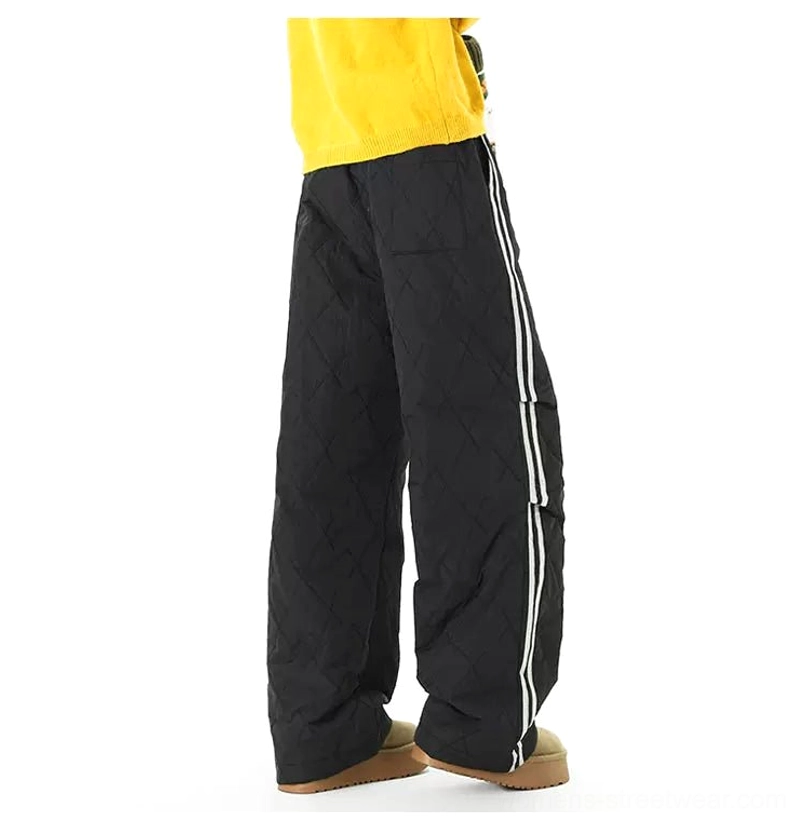 Padded diamond quilted track pants with a loose straight-leg silhouette and contrast racing stripe detail