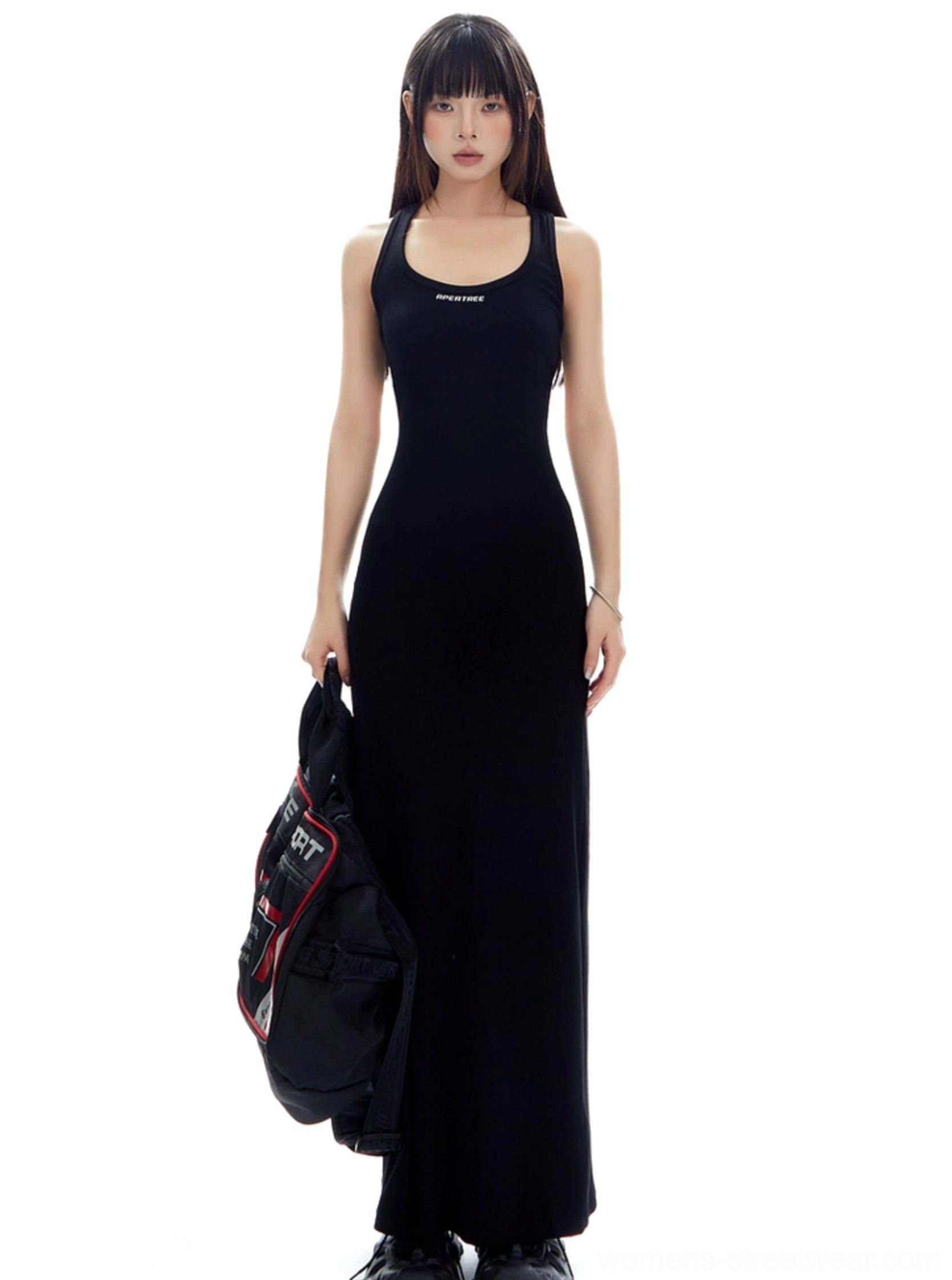 Black ribbed racerback open back maxi streetwear dress in a front full body studio view