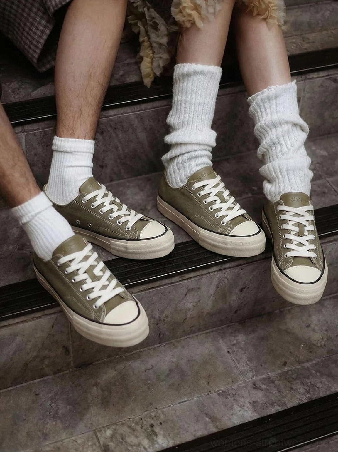 Red canvas low-top platform sneaker with cork midsole and white rubber sole, bold statement piece for street style flat display